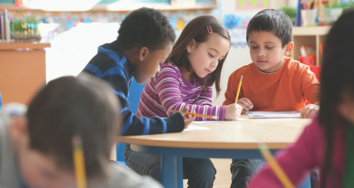 Young learners working together in classroom
