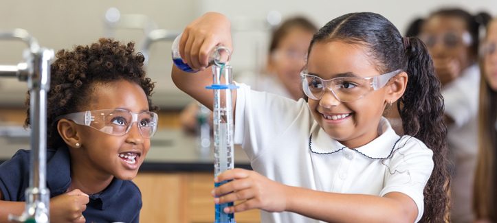 Primary school students in science class